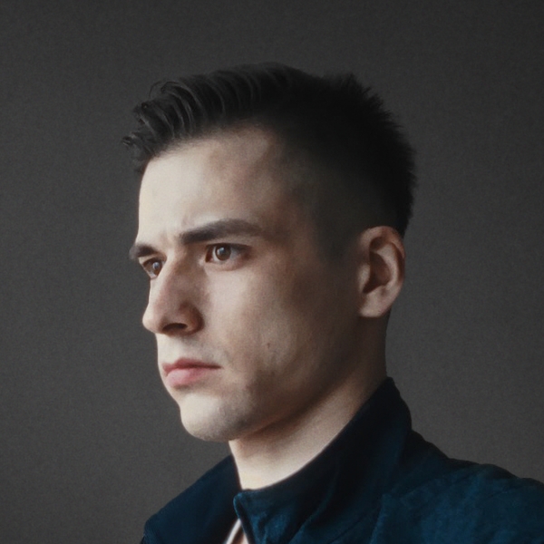 Professional headshot of Anton Meleshkevich